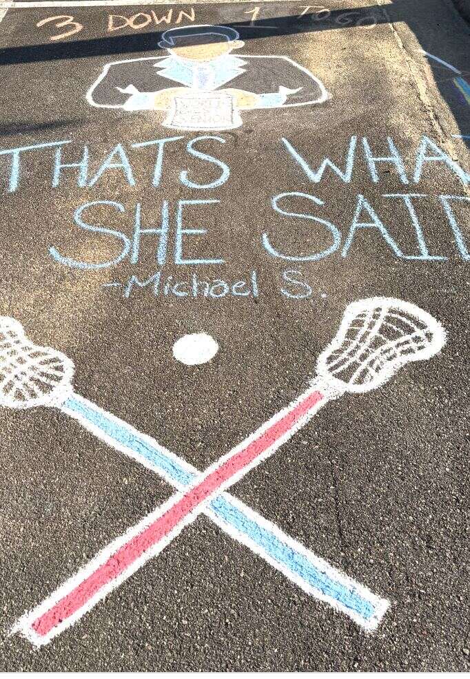 A chalked space with crossed lacrosse sticks reading Three Down, One To Go